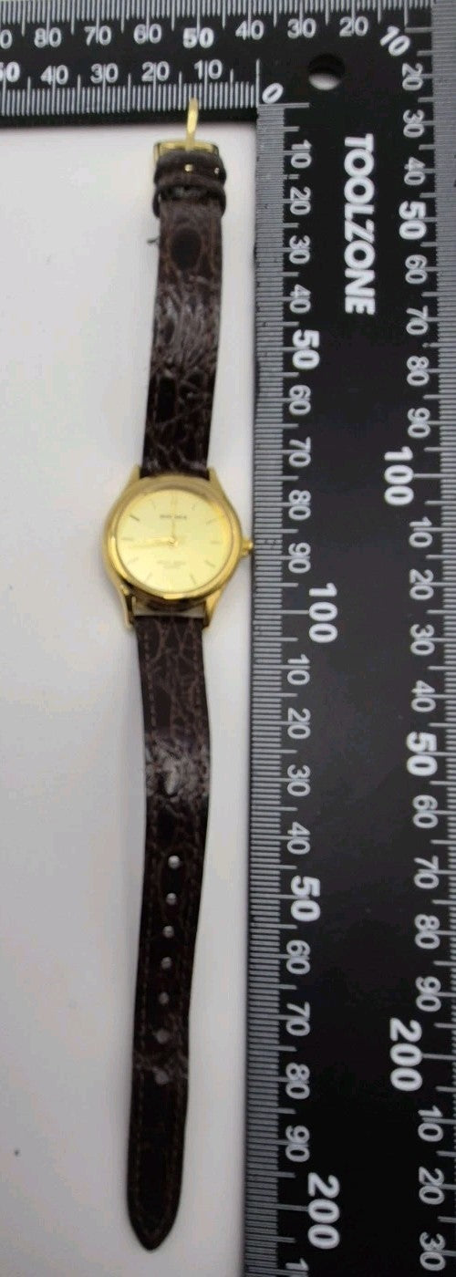 Sekonda Classic Quartz Watch with a gold-plated case and a brown, croc-effect...15