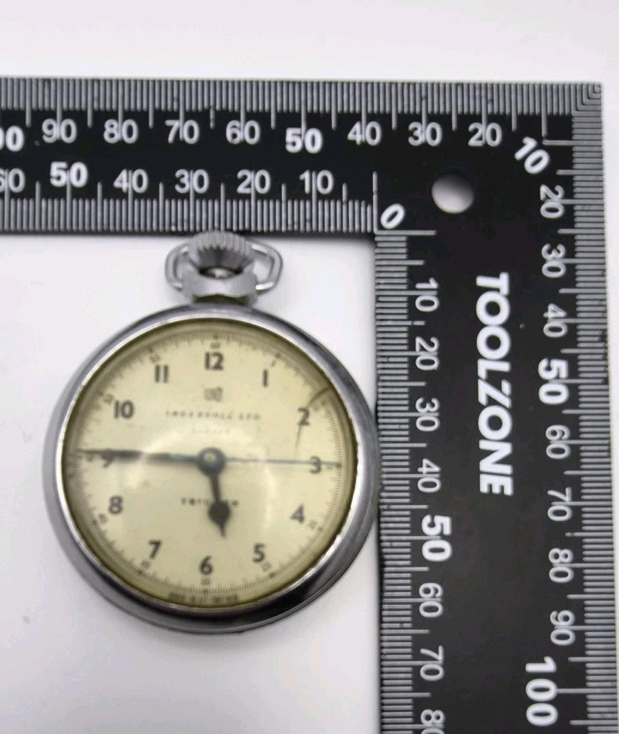 vintage Ingersoll Triumph manual-wind pocket watch. Working. 11