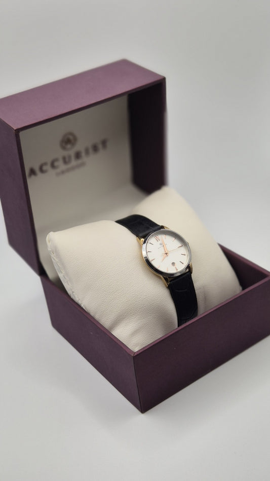 Accurist Ladies Classic Date wristwatch model 8073 with a white dial and...1