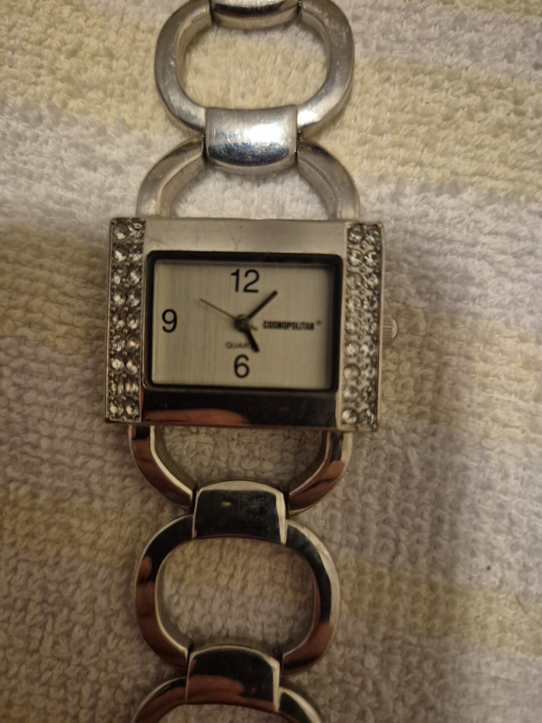 Ladies Cosmopolitan Quartz Watch Stylish Crystal Chrome Bangle Watch1