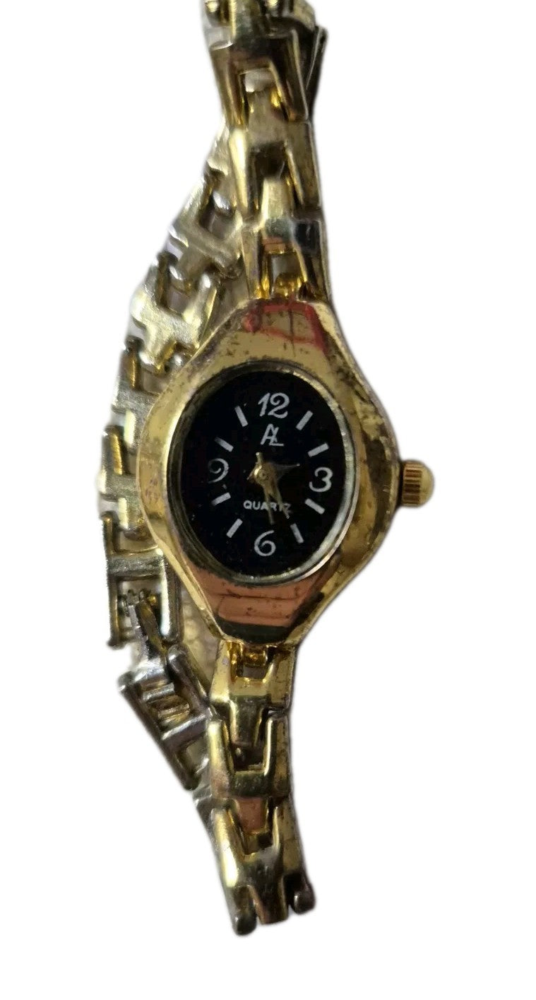 A L Ladies Gold Tone Quartz Wristwatch0