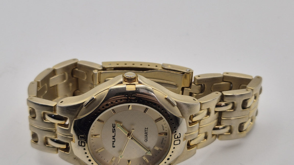gold toned Pulse brand watch9
