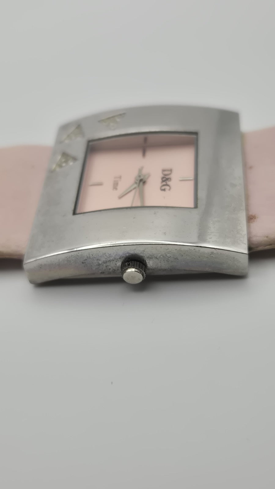 D&G Time squarefaced analog watch with a light pink leather strap and...4