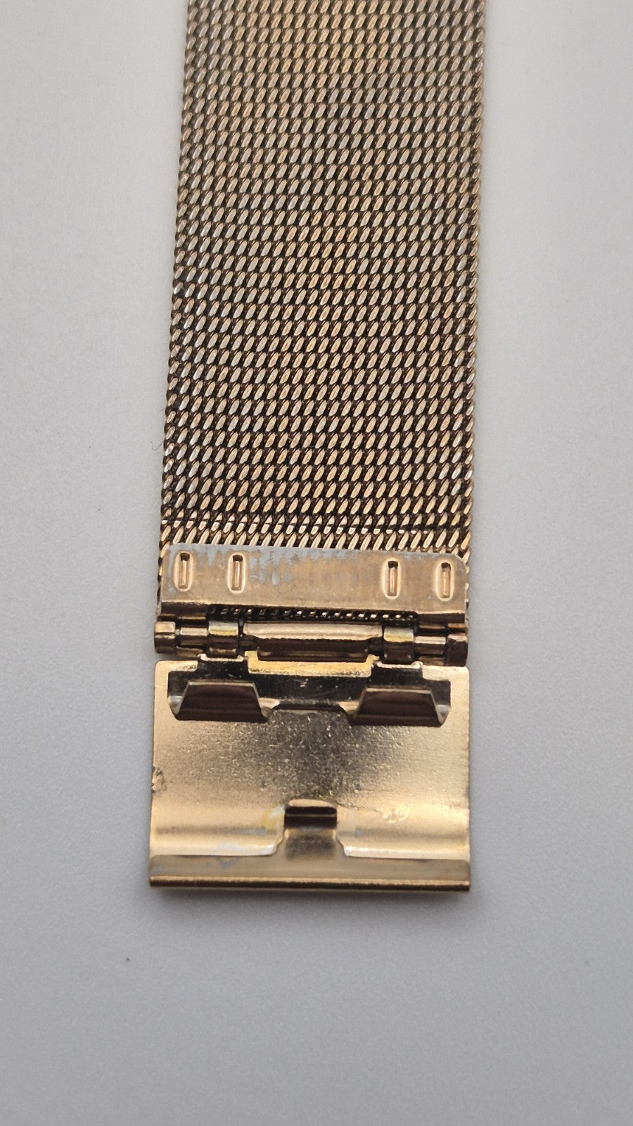 Phasar Quartz digital watch features a gold-tone metal case with wear on the...8