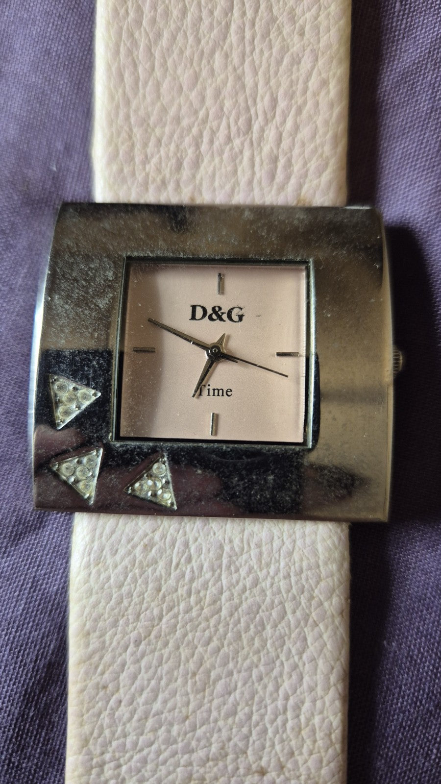 D&G Time squarefaced analog watch with a light pink leather strap and...0