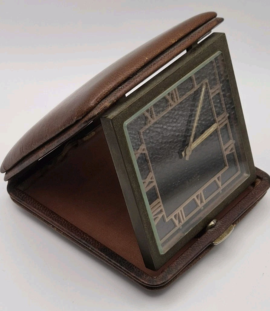 Art Deco 8 day travel clock retailed by Charles Packer London1