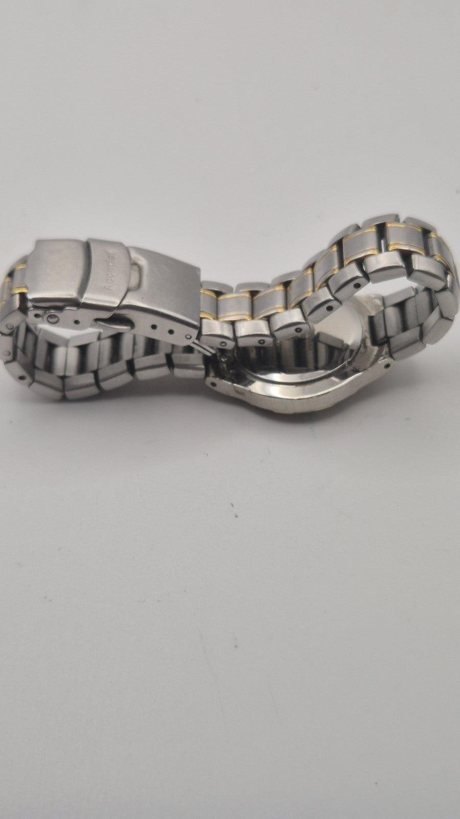 Accurist watch with a blue dial and two-tone bracelet.12