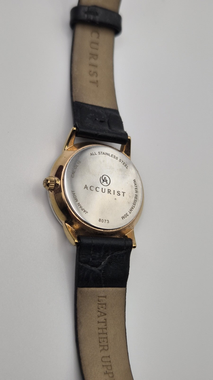 Accurist Ladies Classic Date wristwatch model 8073 with a white dial and...21