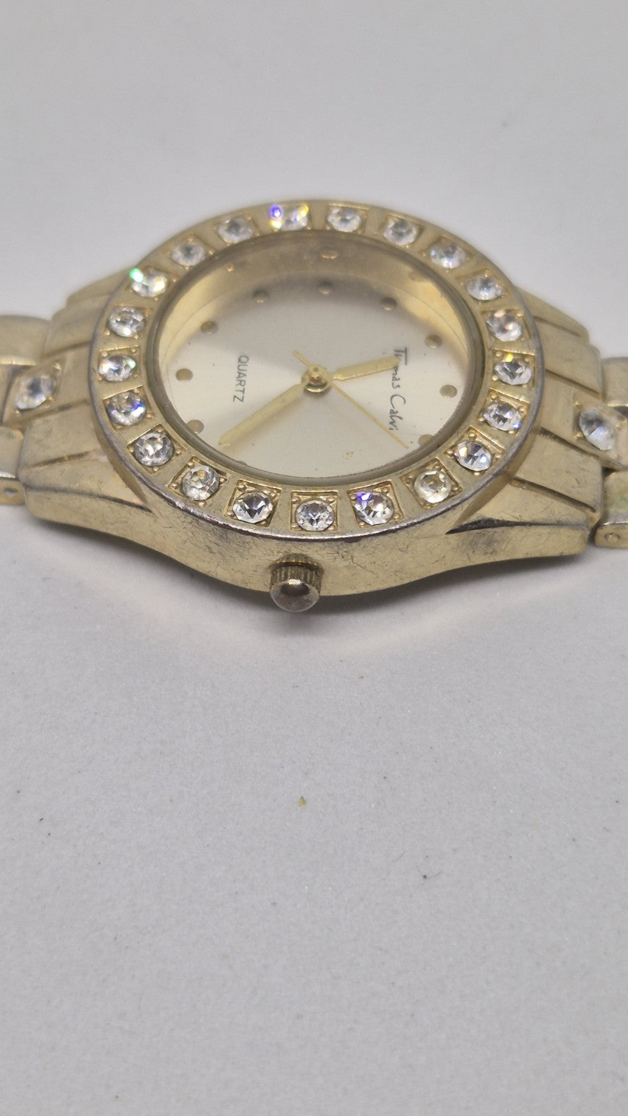Thomas Calvi analog quartz wristwatch with a goldtoned band and a...4