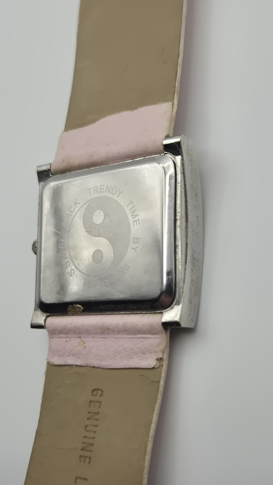 D&G Time squarefaced analog watch with a light pink leather strap and...8