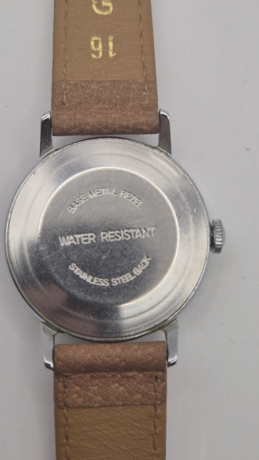 Vintage Timex Snoopy "Tennis" watch features a yellow dial with a mechanical...14
