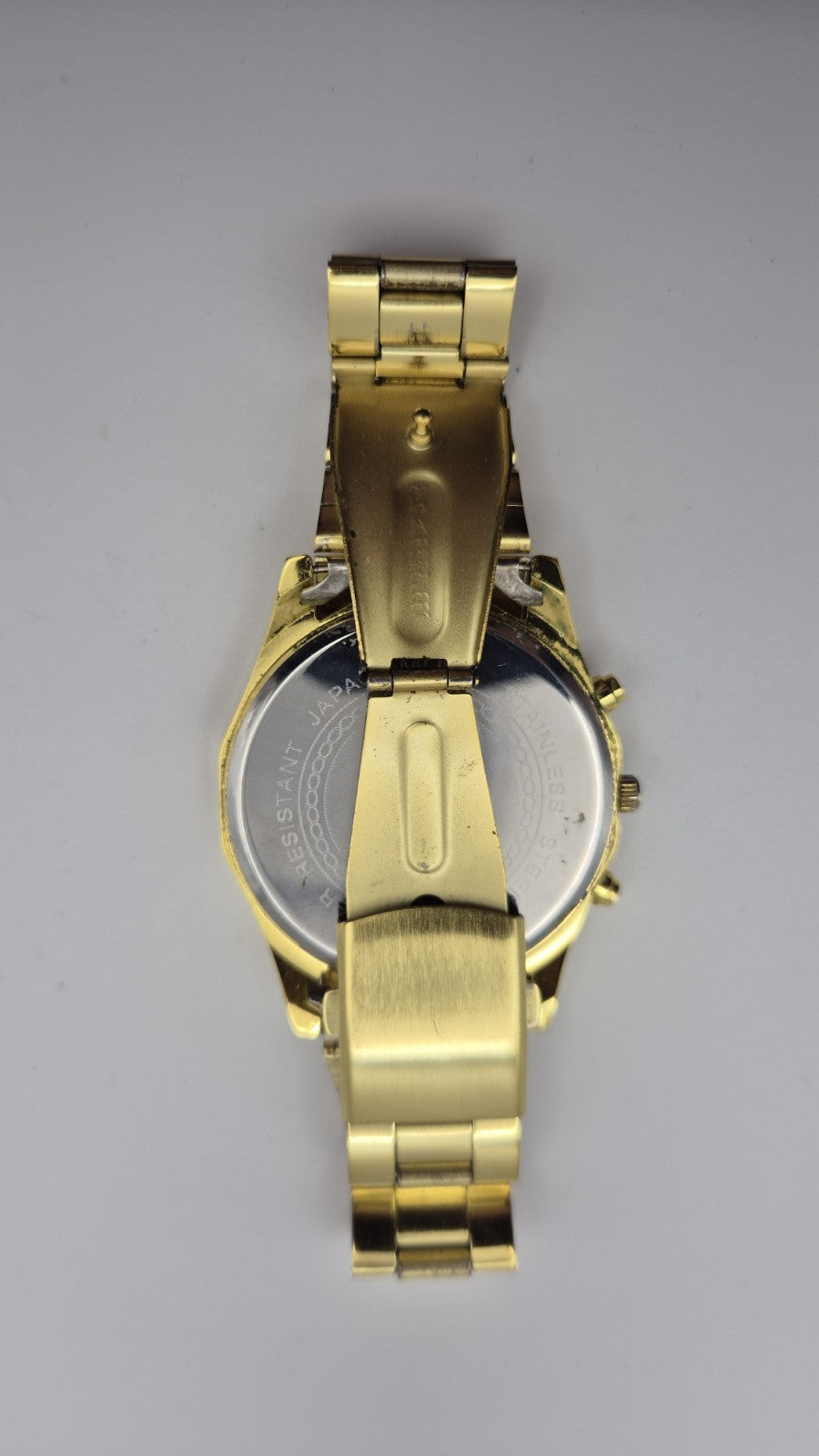 Oruss 1853 men's gold-tone quartz chronograph watch featuring a black tachymetre13