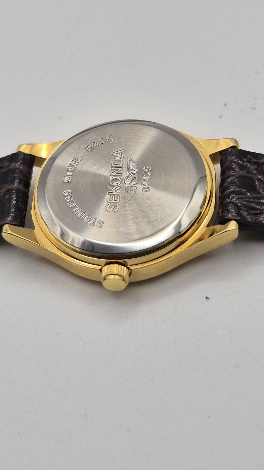 Sekonda Classic Quartz Watch with a gold-plated case and a brown, croc-effect...12
