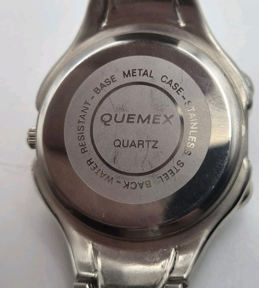 Mens Quemex quartz wristwatch with a silver-tone stainless steel case and...15