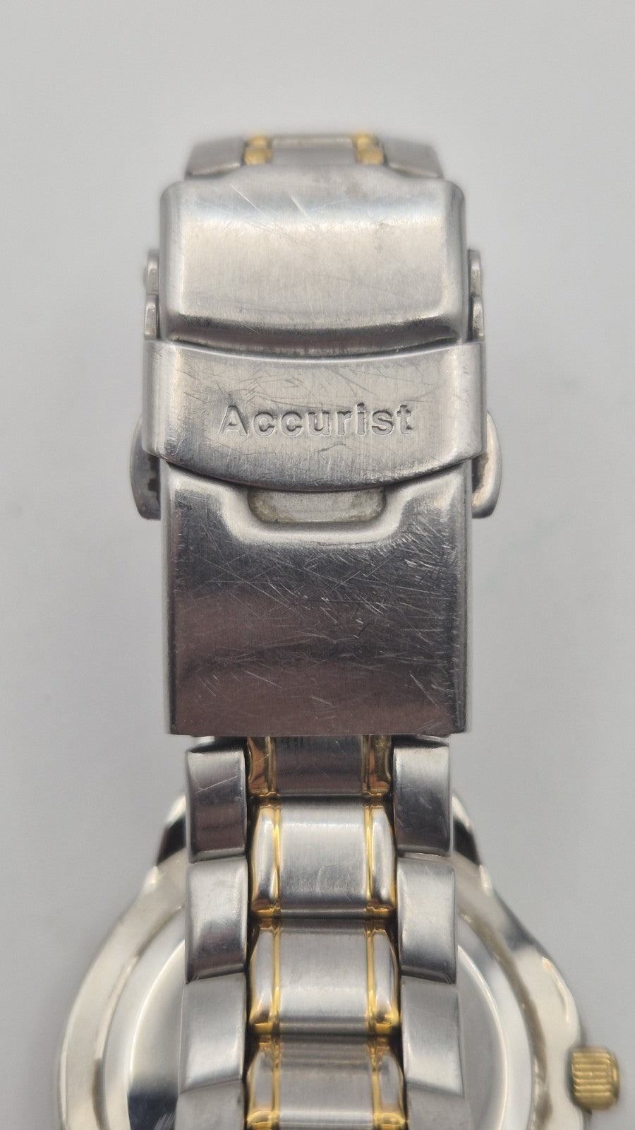 Accurist watch with a blue dial and two-tone bracelet.11