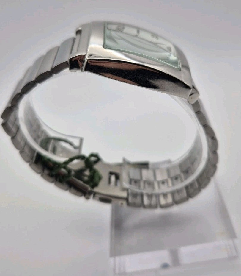 BNWT Quemex quartz Mens watch featuring a silver tone rectangular case and...2