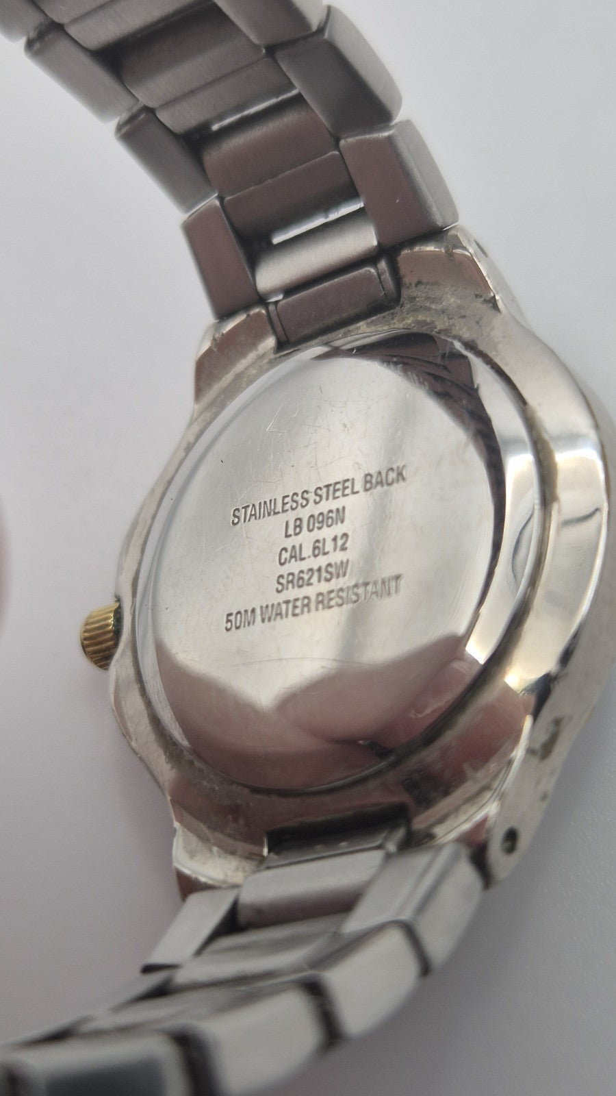 Accurist watch with a blue dial and two-tone bracelet.13