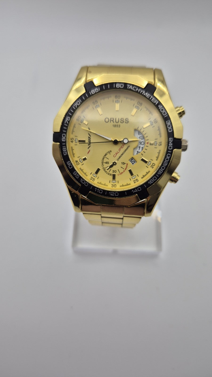 Oruss 1853 men's gold-tone quartz chronograph watch featuring a black tachymetre2