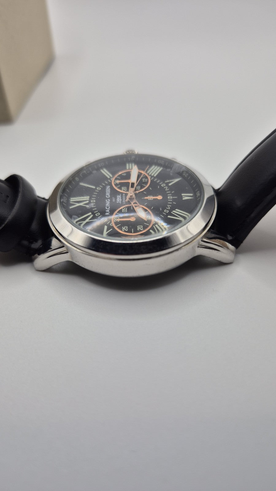 Racing Green men's chronograph watch with a black leather strap and orange...11