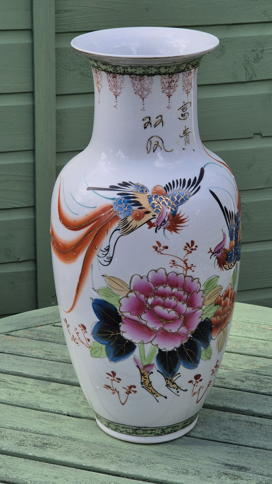 Chinese porcelain baluster style vase featuring a colorful bird of paradise0