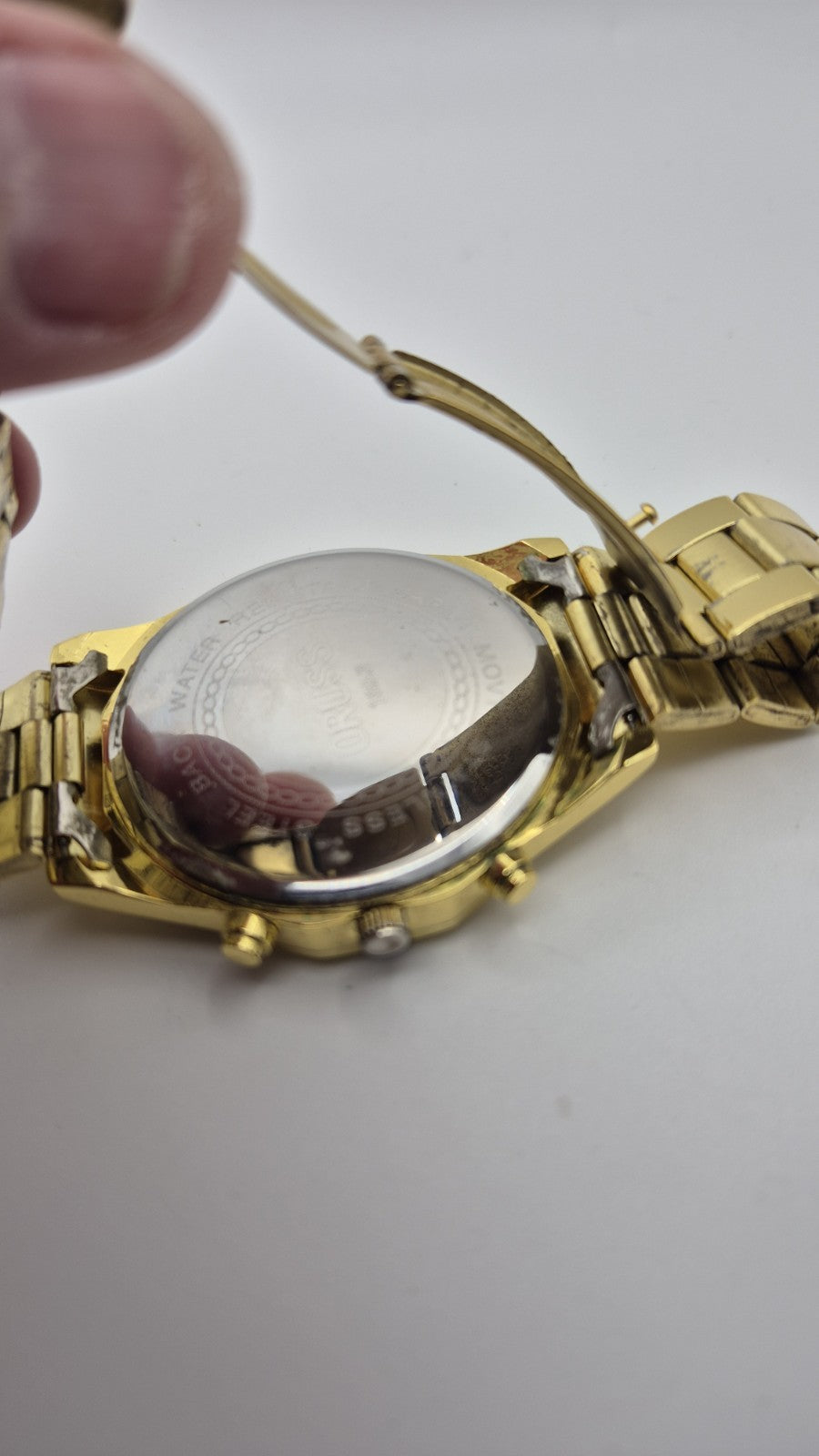 Oruss 1853 men's gold-tone quartz chronograph watch featuring a black tachymetre14