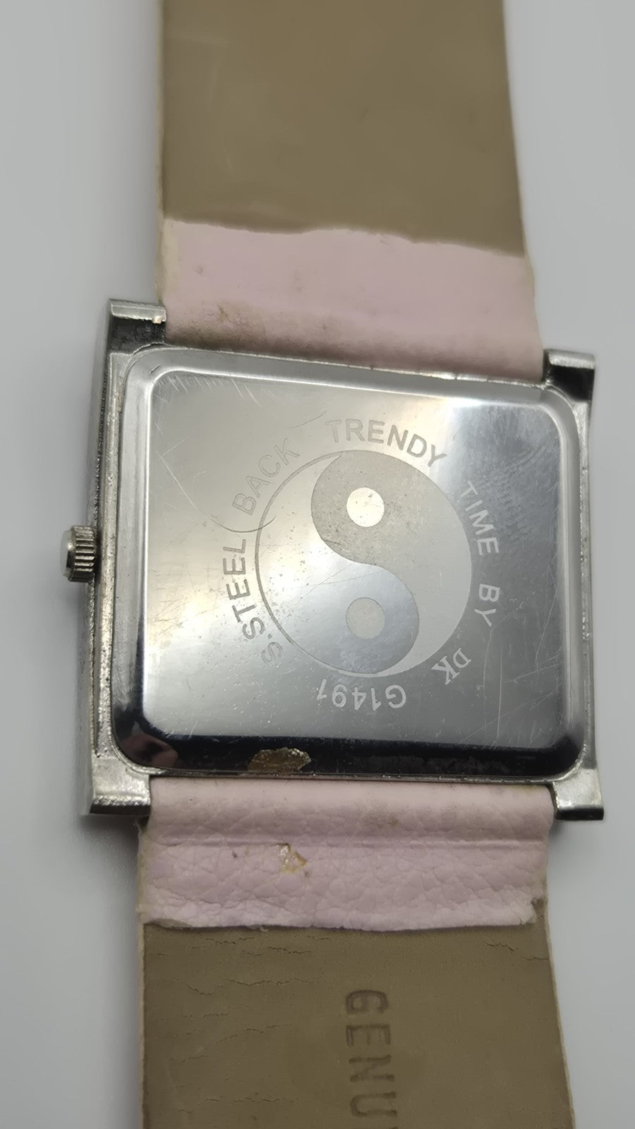 D&G Time squarefaced analog watch with a light pink leather strap and...7