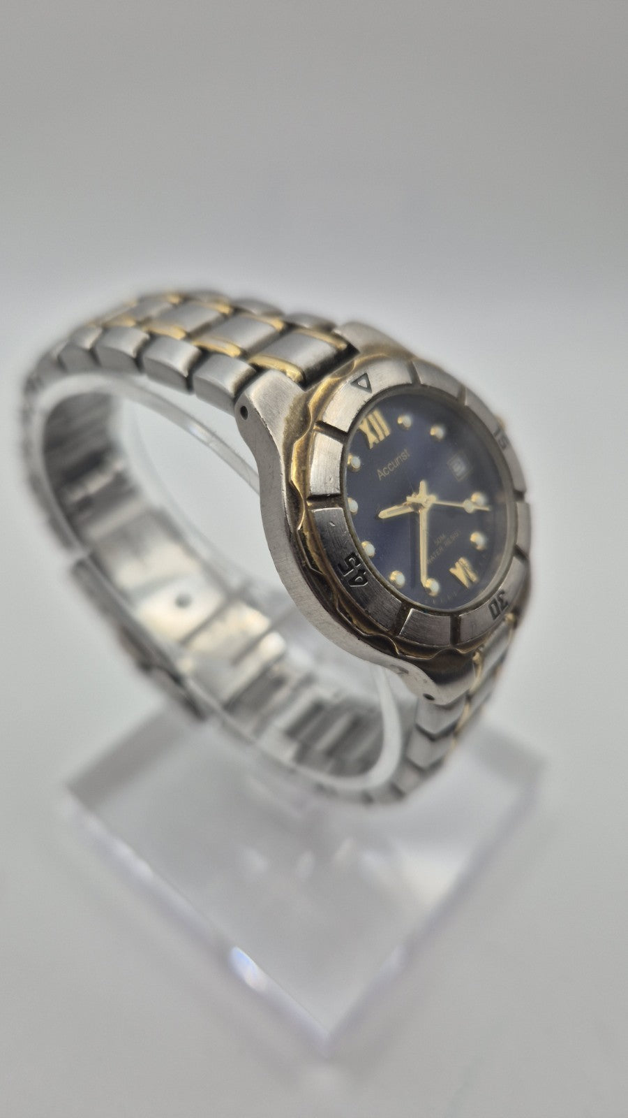 Accurist watch with a blue dial and two-tone bracelet.2