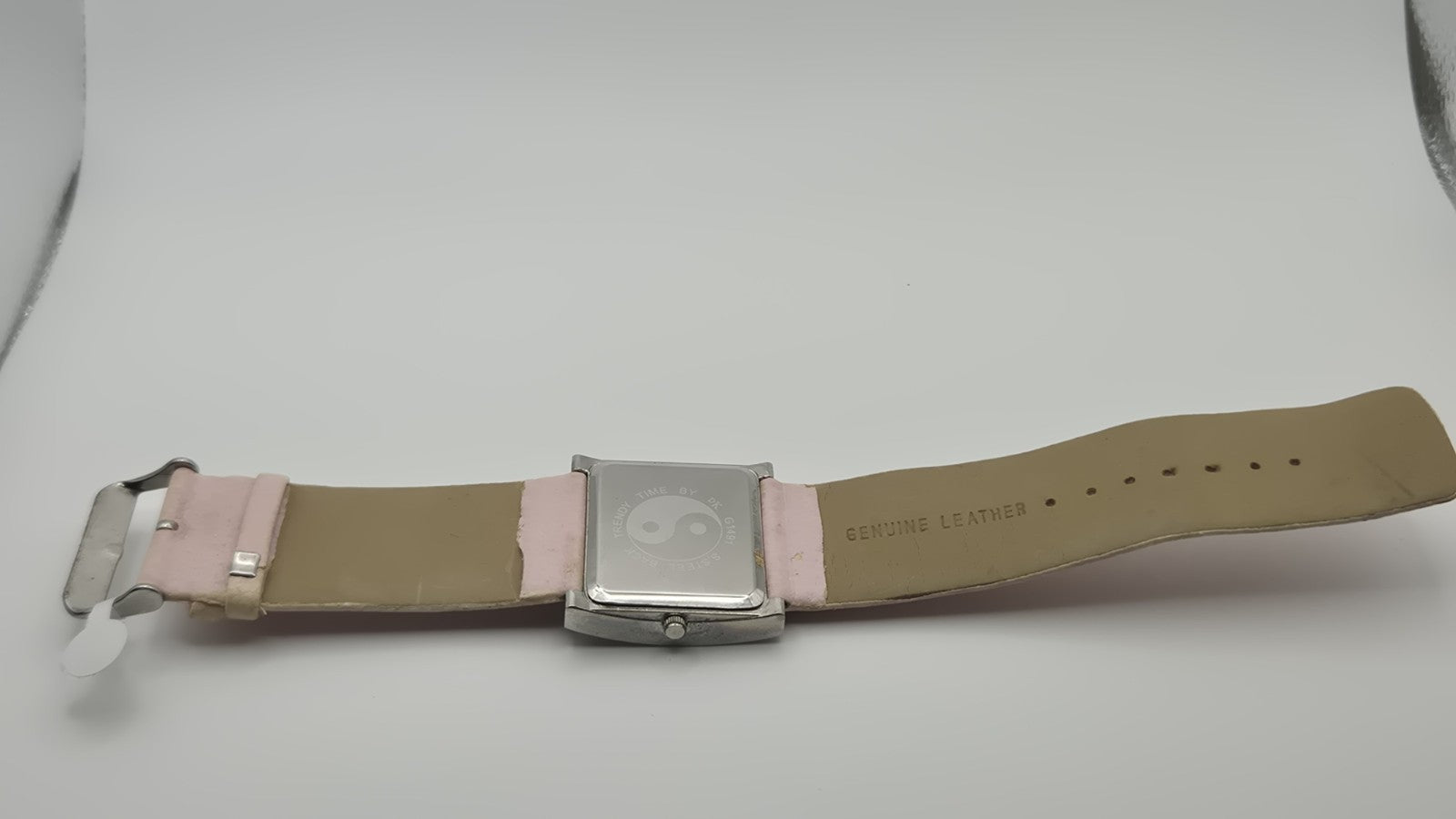 D&G Time squarefaced analog watch with a light pink leather strap and...11