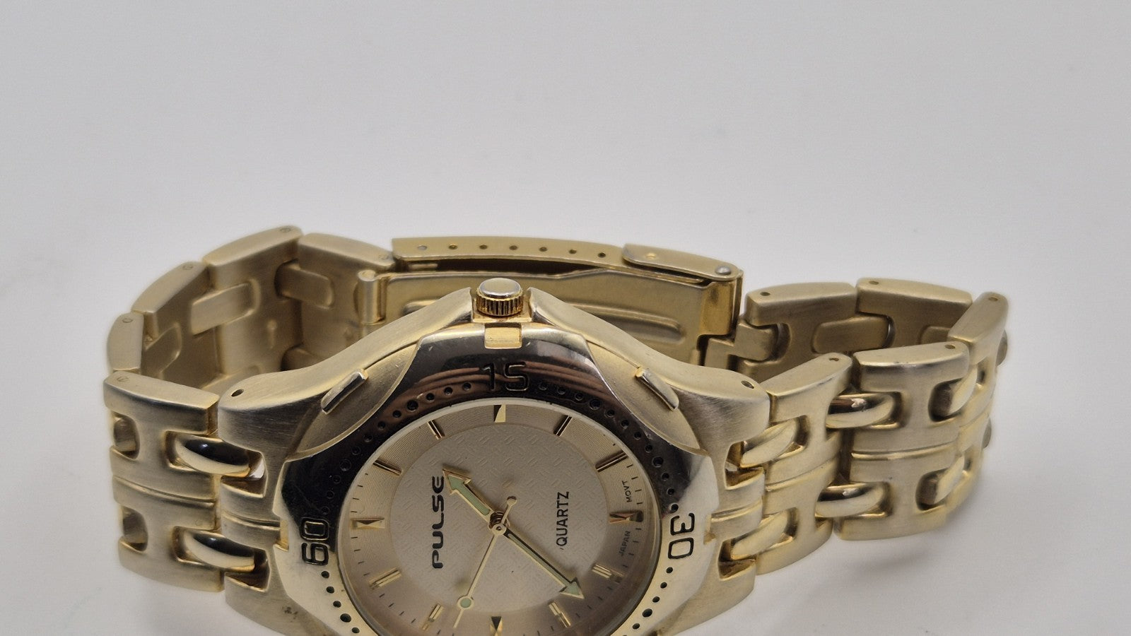 gold-toned Pulse brand watch9