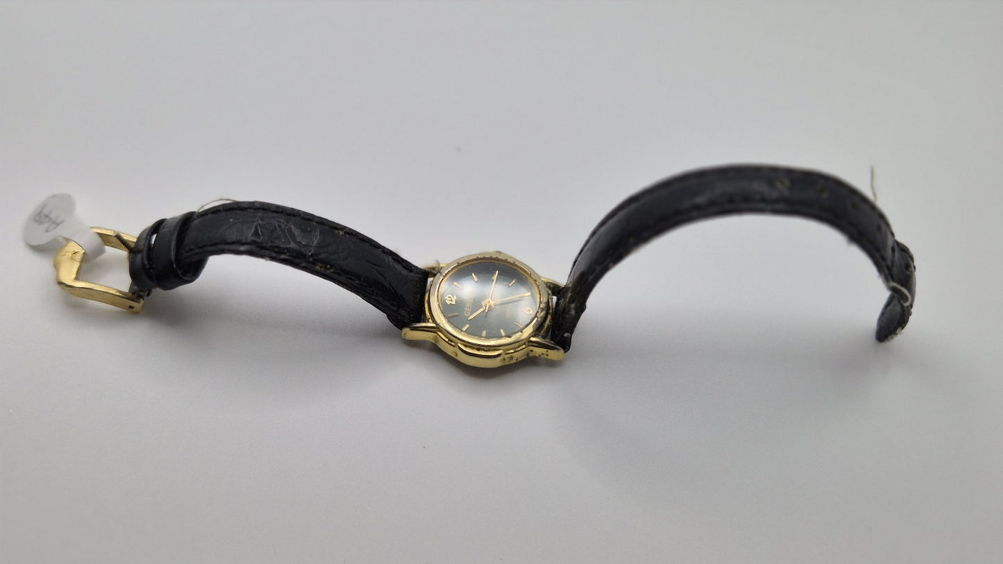 Geneva women's quartz watch with a green dial and goldtone case.4