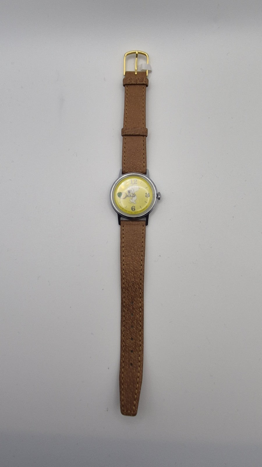 Vintage Timex Snoopy "Tennis" watch features a yellow dial with a mechanical...9