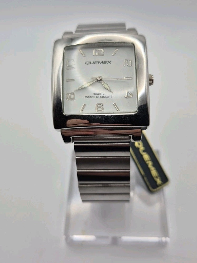 BNWT Quemex quartz Mens watch featuring a silver tone rectangular case and...0