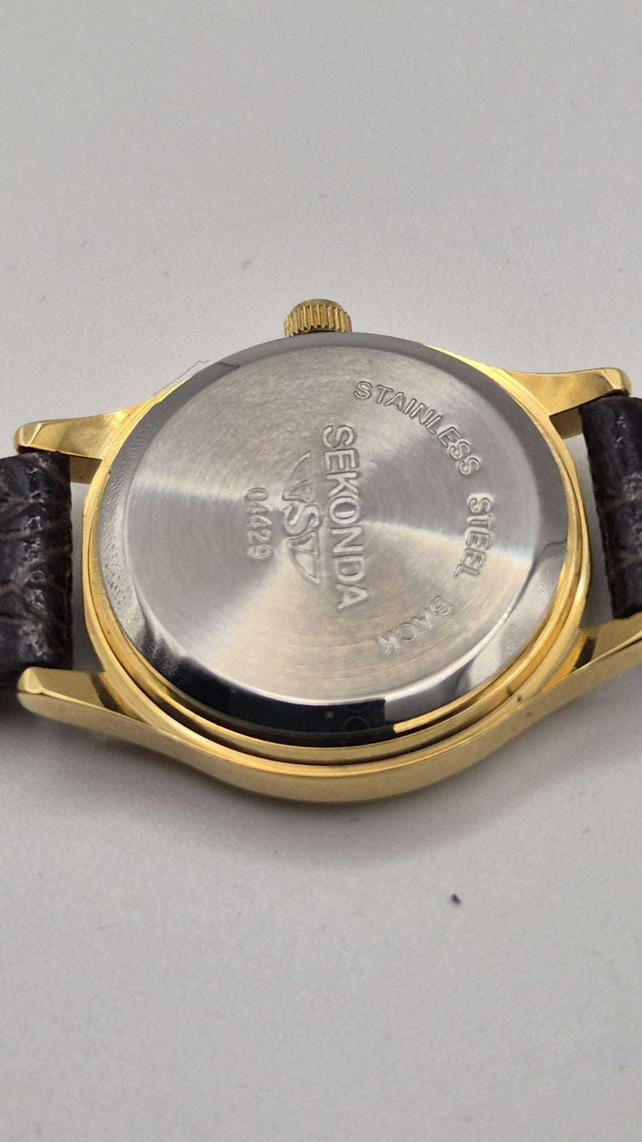 Sekonda Classic Quartz Watch with a gold-plated case and a brown, croc-effect...11
