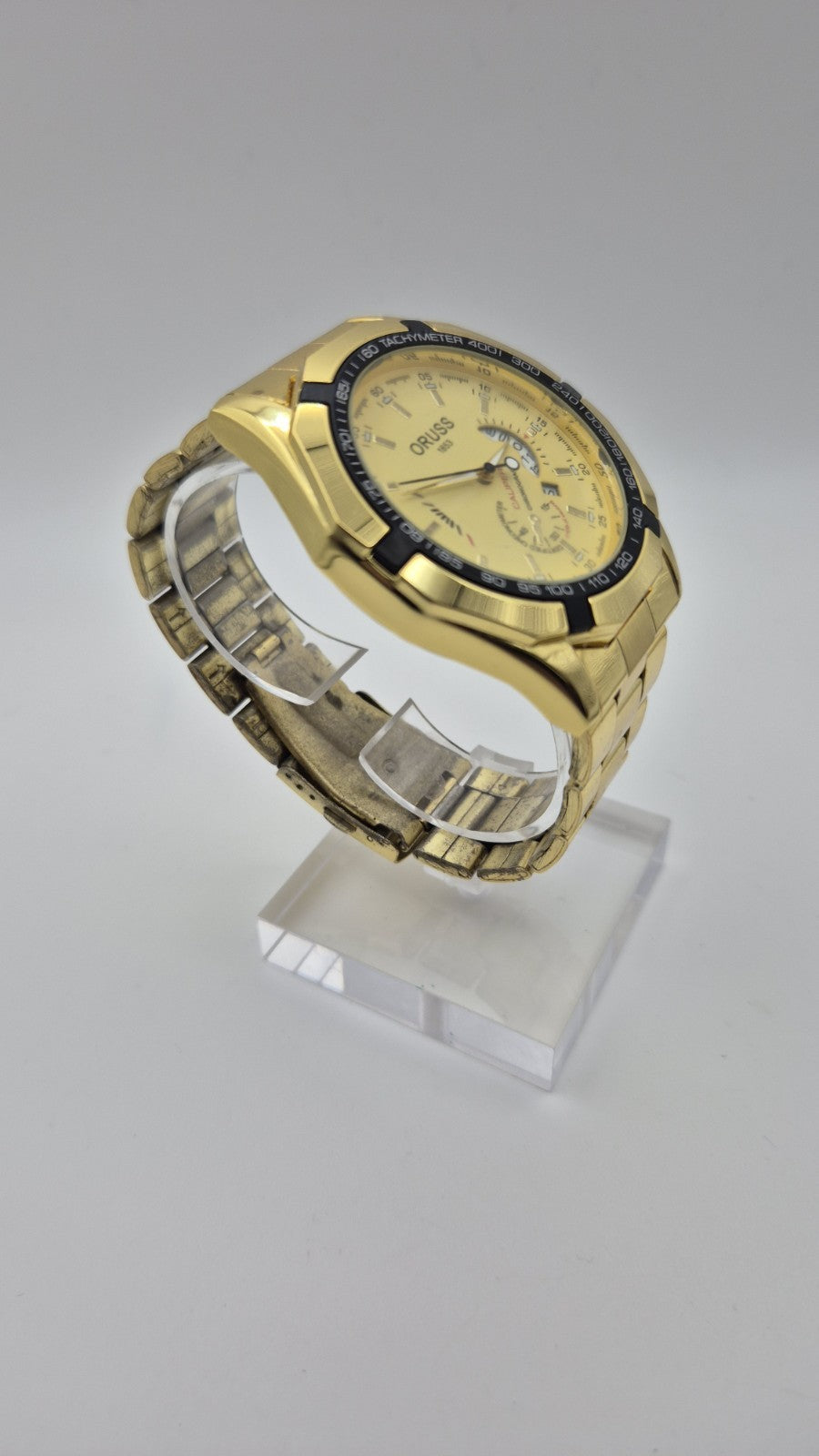 Oruss 1853 men's gold-tone quartz chronograph watch featuring a black tachymetre3