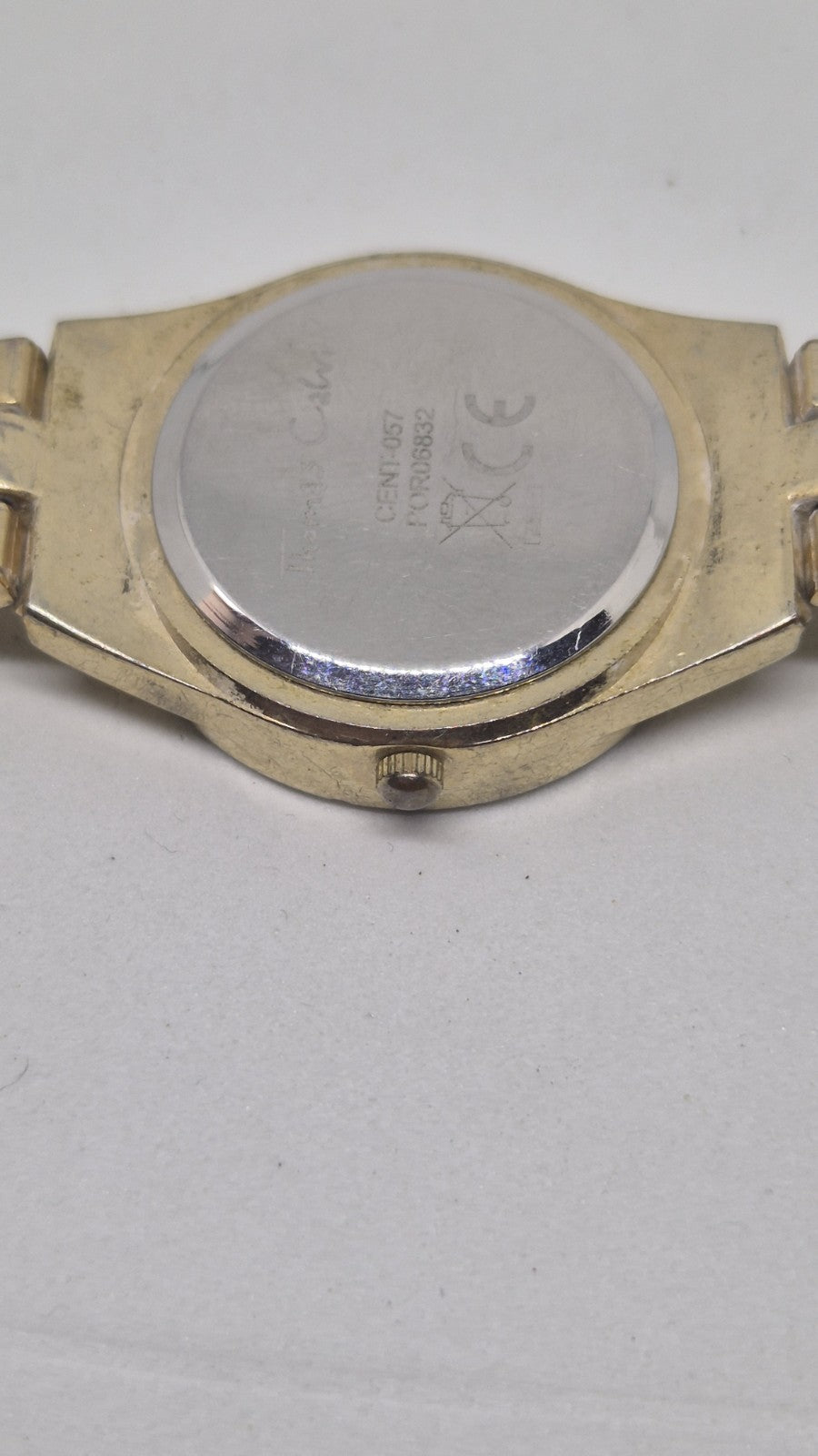 Thomas Calvi analog quartz wristwatch with a goldtoned band and a...9