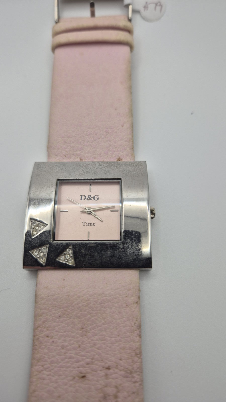 D&G Time squarefaced analog watch with a light pink leather strap and...1