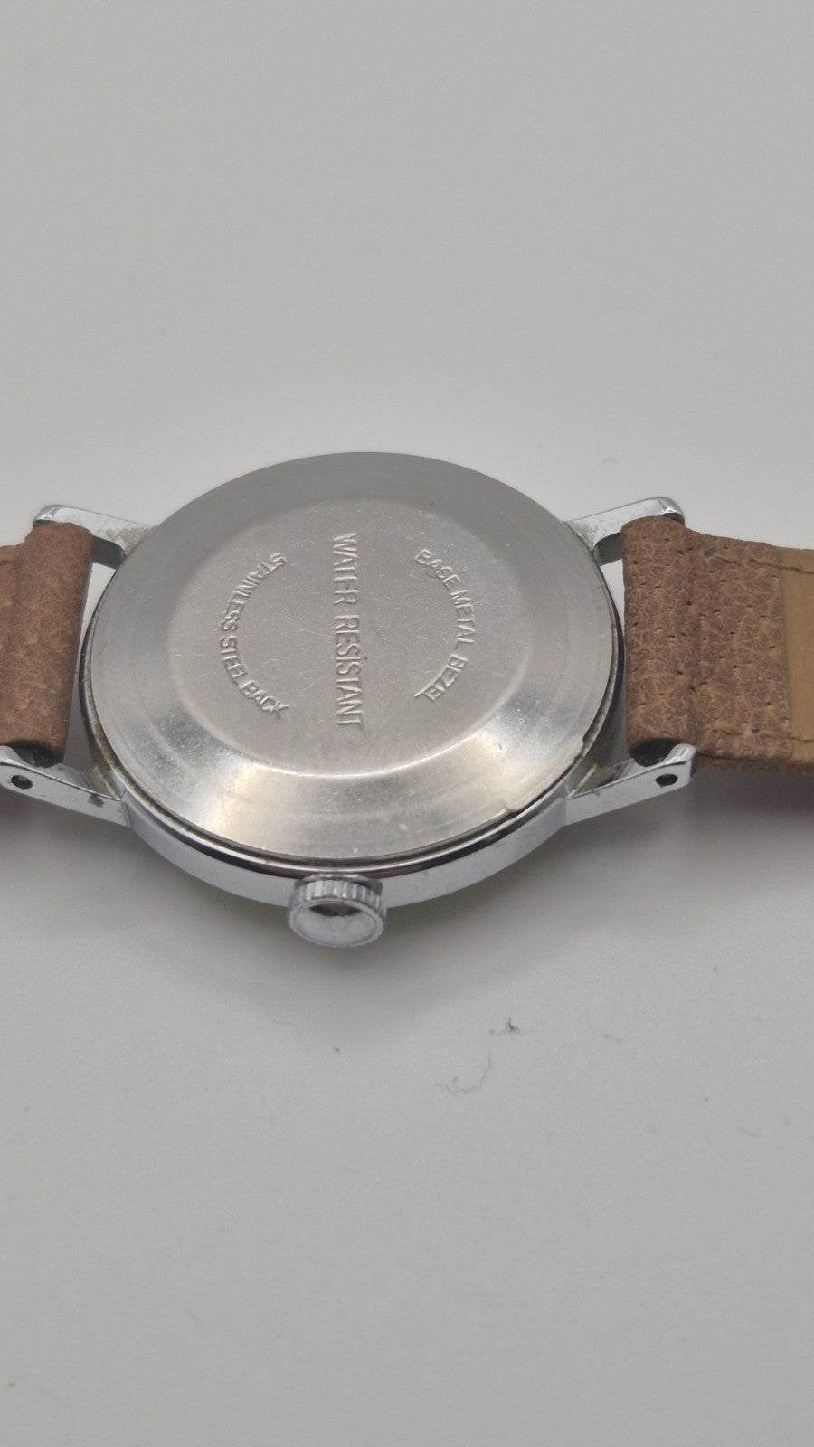Vintage Timex Snoopy "Tennis" watch features a yellow dial with a mechanical...11