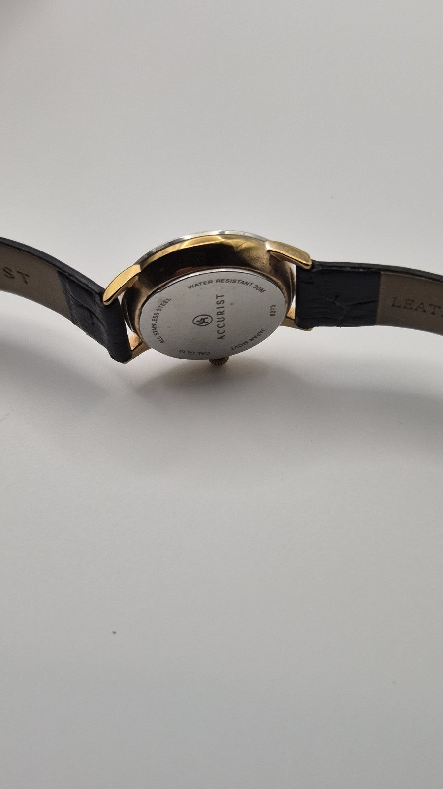 Accurist Ladies Classic Date wristwatch model 8073 with a white dial and...16