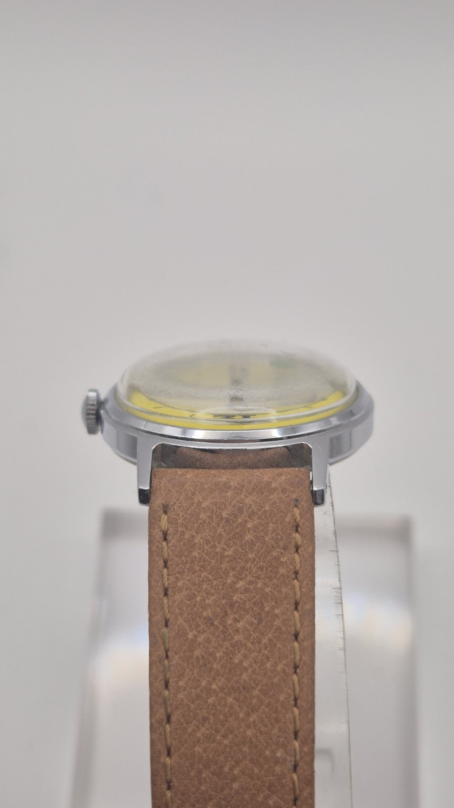 Vintage Timex Snoopy "Tennis" watch features a yellow dial with a mechanical...6