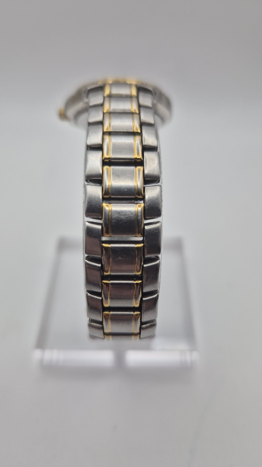 Accurist watch with a blue dial and two-tone bracelet.5