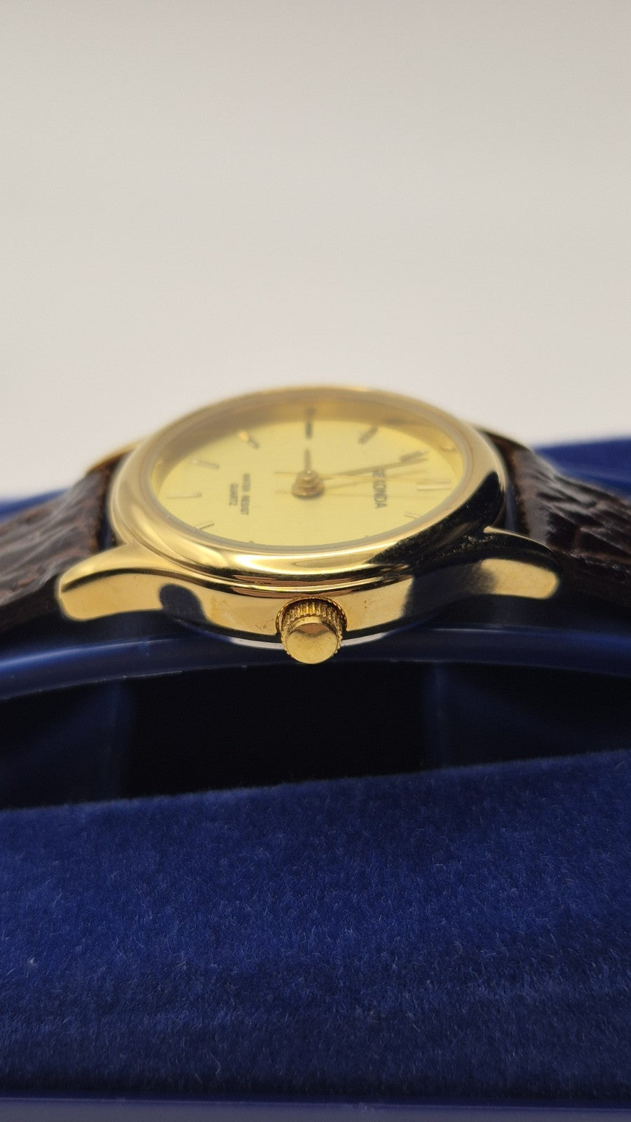 Sekonda Classic Quartz Watch with a gold-plated case and a brown, croc-effect...3