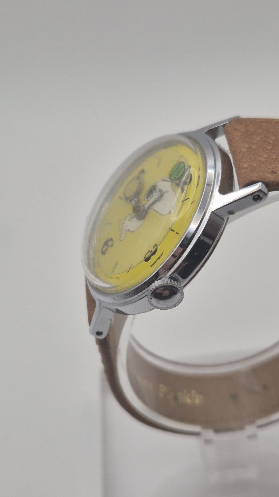 Vintage Timex Snoopy "Tennis" watch features a yellow dial with a mechanical...8