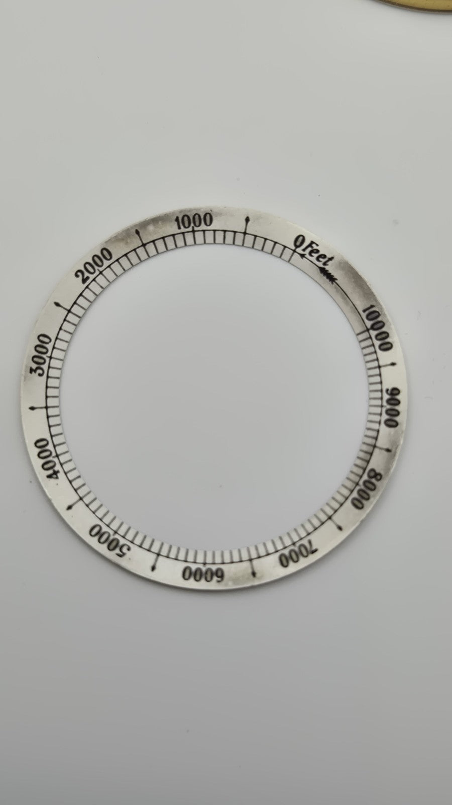Antique pocket barometer with an altimeter scale in a brass case.17