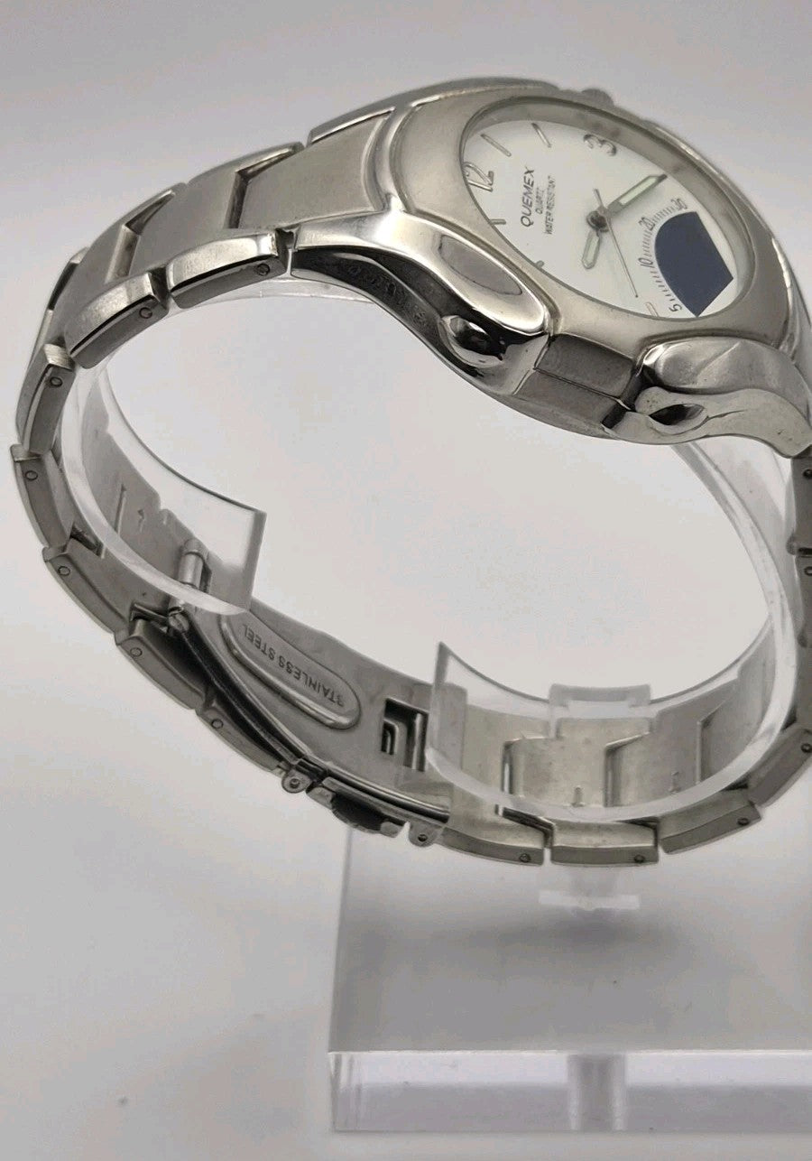 Mens Quemex quartz wristwatch with a silver-tone stainless steel case and...3