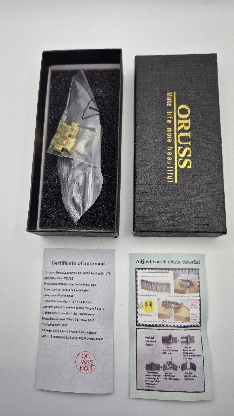 Oruss 1853 men's gold-tone quartz chronograph watch featuring a black tachymetre16