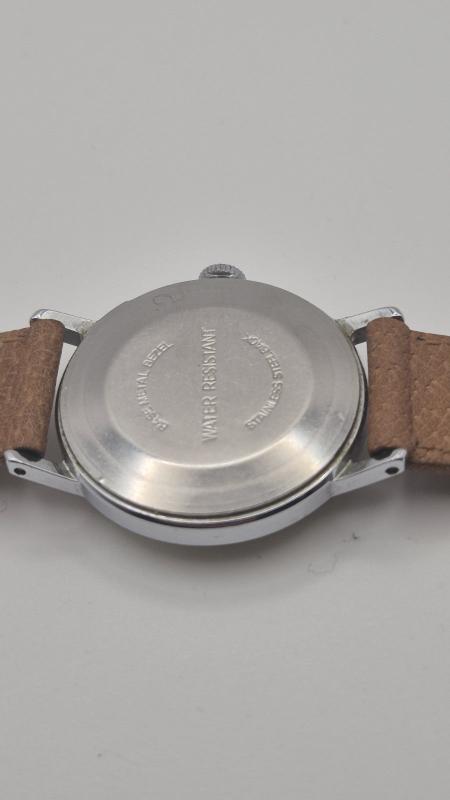 Vintage Timex Snoopy "Tennis" watch features a yellow dial with a mechanical...12
