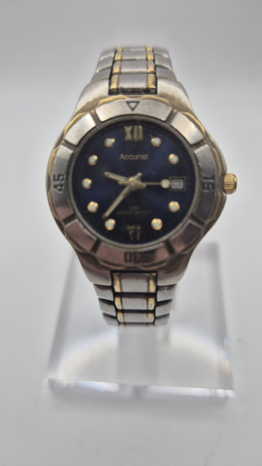 Accurist watch with a blue dial and two-tone bracelet.1