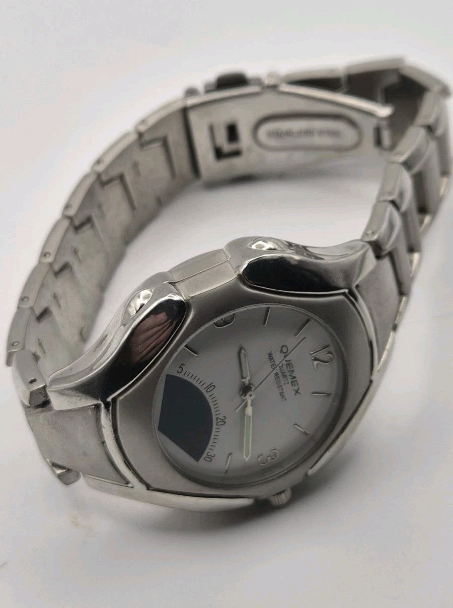 Mens Quemex quartz wristwatch with a silver-tone stainless steel case and...9