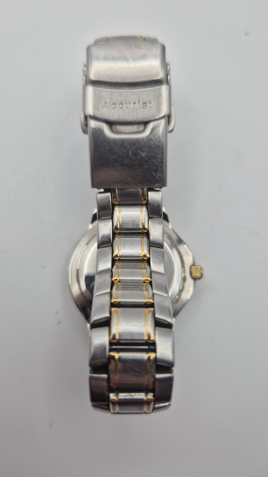 Accurist watch with a blue dial and two-tone bracelet.10