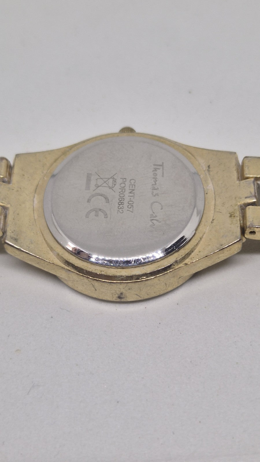 Thomas Calvi analog quartz wristwatch with a goldtoned band and a...14